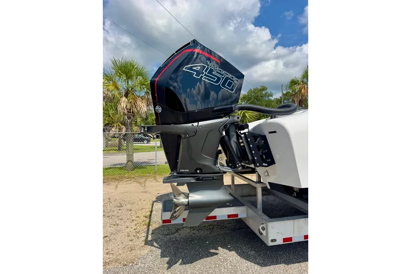  Yacht Photos Pics 2024 Fountain 34 Thundercat with powerful outboard engine on trailer.