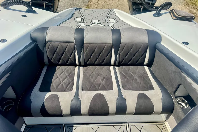  Yacht Photos Pics 2024 Fountain 34 Thundercat boat interior with stylish, cushioned seating and modern design.