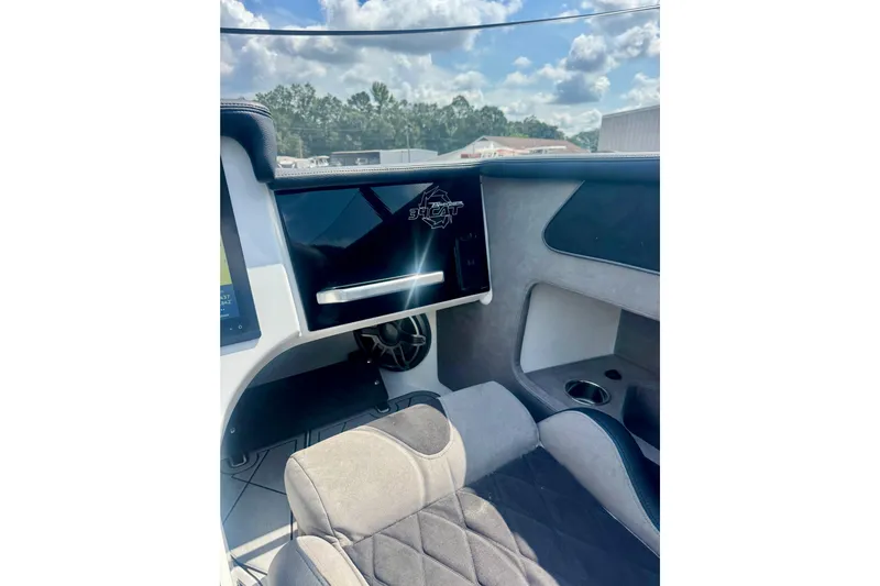  Yacht Photos Pics Interior of 2024 Fountain 34 Thundercat boat, featuring sleek design and comfortable seating.