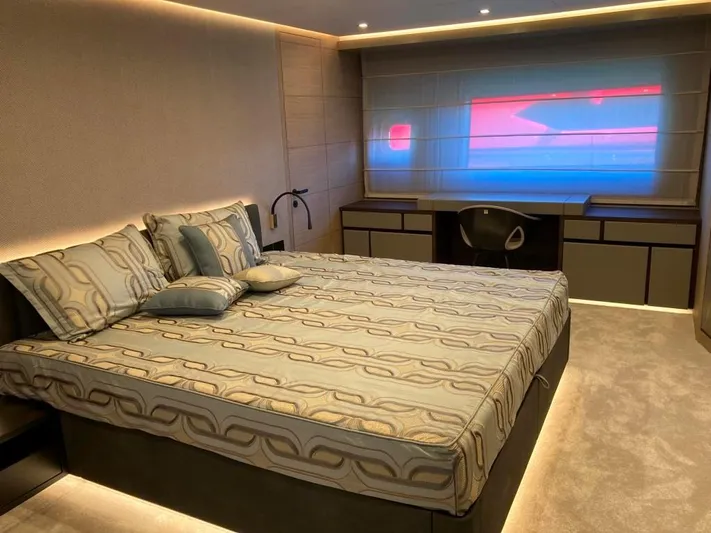  Yacht Photos Pics Luxurious bedroom interior on 2022 AB Yachts 100, featuring modern design and ambient lighting.