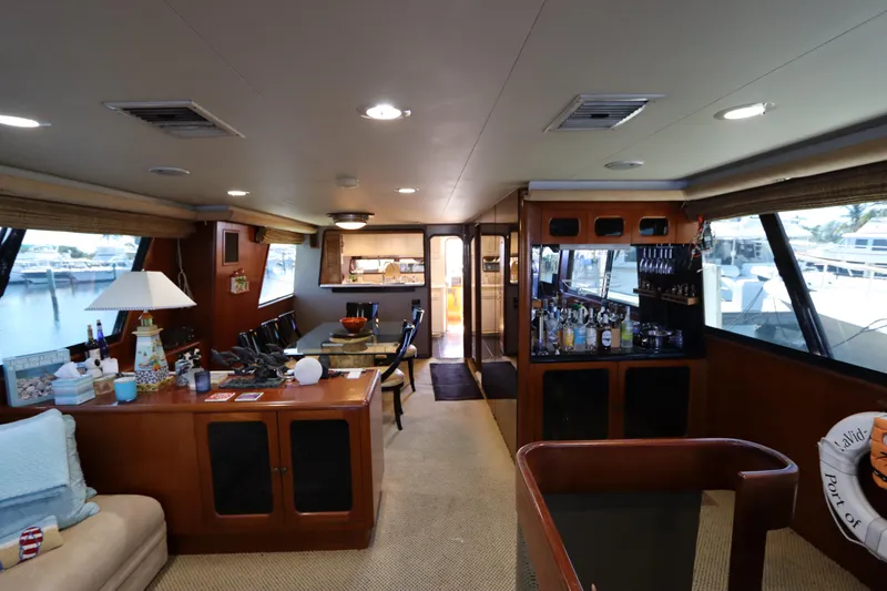  Yacht Photos Pics Interior of a 1991 Viking Motor Yacht with a cozy living area and bar.