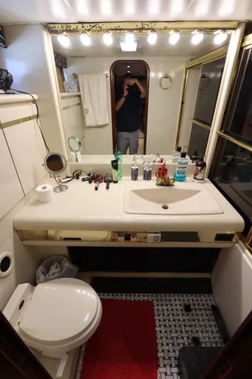  Yacht Photos Pics Bathroom interior of a 1991 Viking Motor Yacht with vanity and toilet.