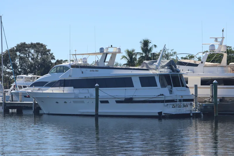  Yacht Photos Pics 1991 Viking Motor Yacht docked at a marina.