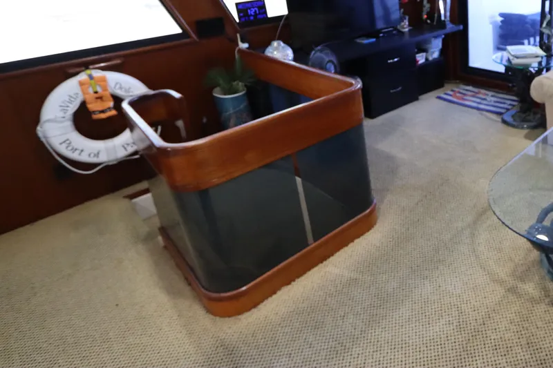  Yacht Photos Pics Interior of a 1991 Viking Motor Yacht with a wooden staircase and life preserver.