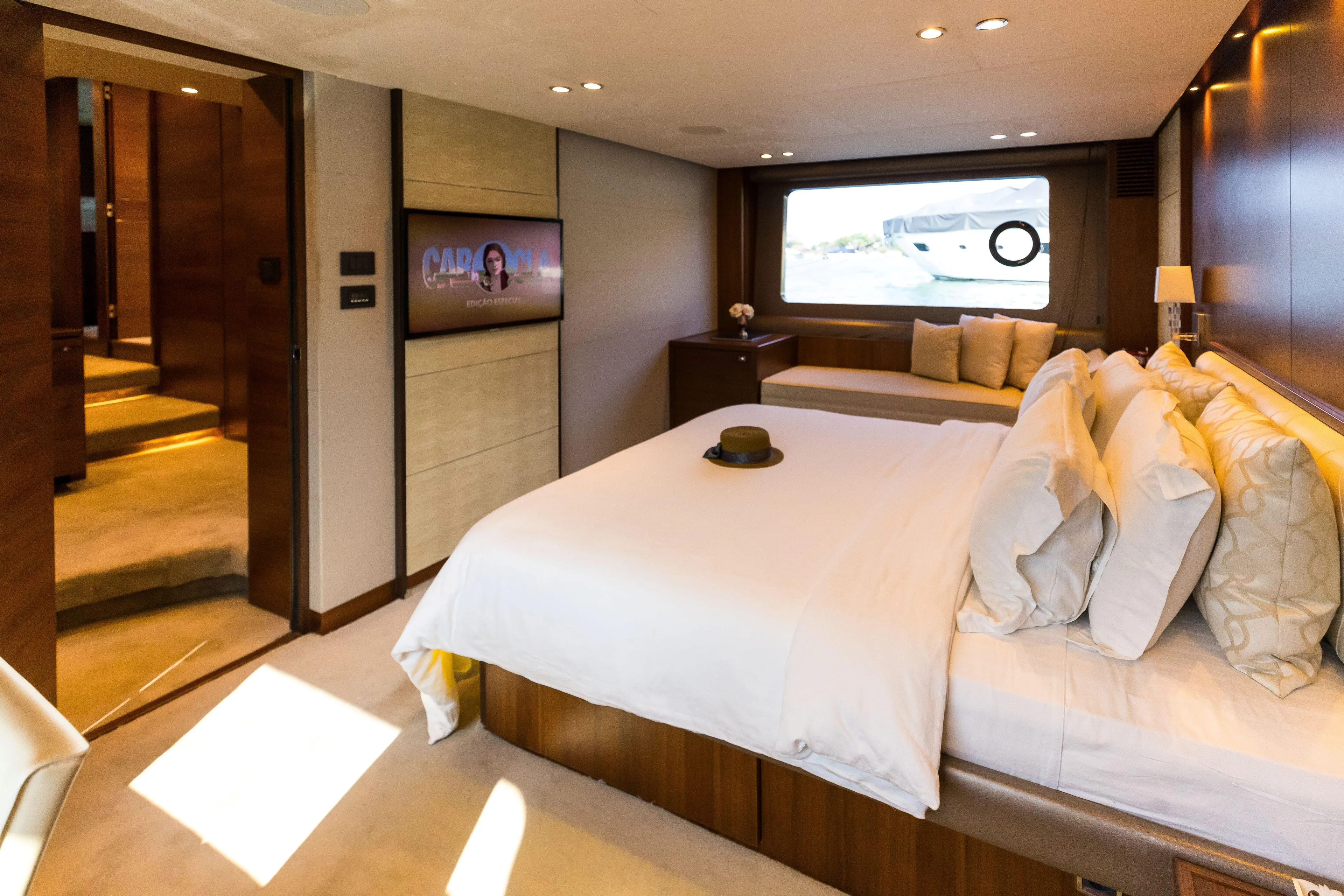Far Niente Yacht Photos Pics Luxurious bedroom interior of 2014 Princess Flybridge 82 Motor Yacht with elegant decor.