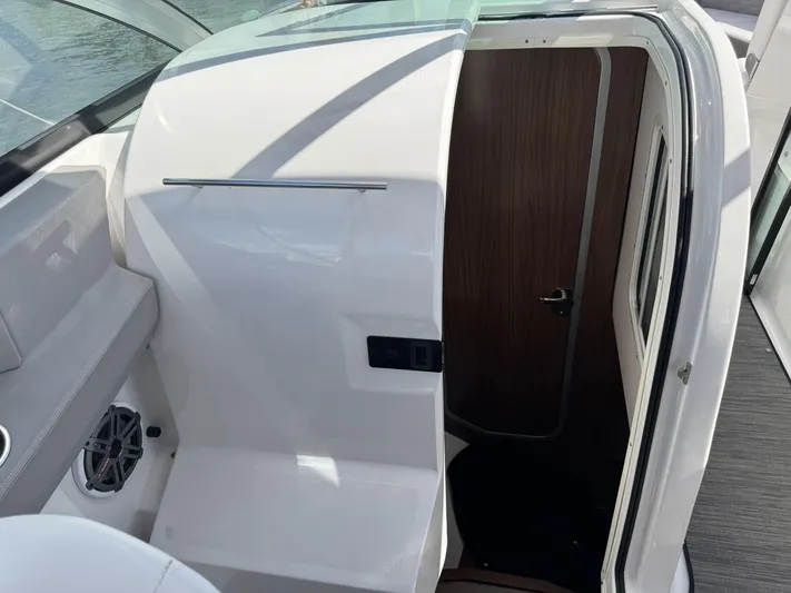 Love You More Yacht Photos Pics 2019 Four Winns 350H boat interior with cabin door and speaker.