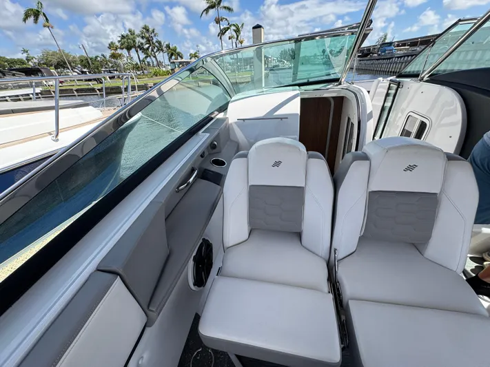 Love You More Yacht Photos Pics 2019 Four Winns 350H boat interior with plush seating and sleek design.