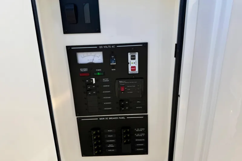  Yacht Photos Pics Electrical control panel on a 2021 Sea Ray SLX 310 Outboard boat.