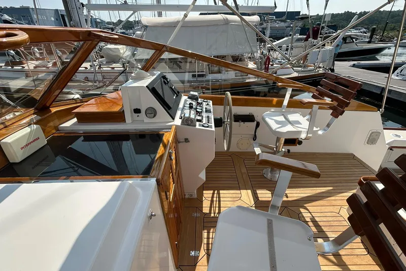 Renegade Yacht Photos Pics 1994 Little Harbor Express yacht cockpit with wooden accents and steering wheel.