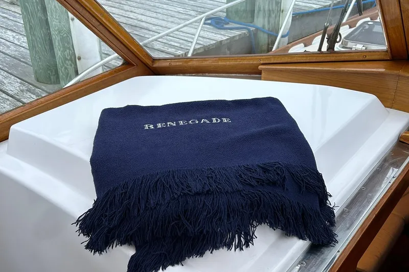 Renegade Yacht Photos Pics Navy blanket with "Renegade" on 1994 Little Harbor Express boat deck.