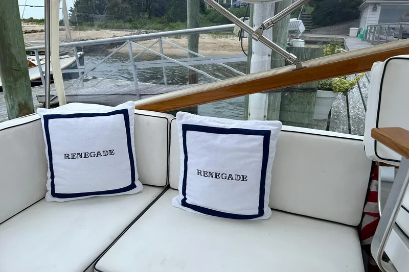 Renegade Yacht Photos Pics Cushioned seating on 1994 Little Harbor Express boat with "Renegade" pillows.