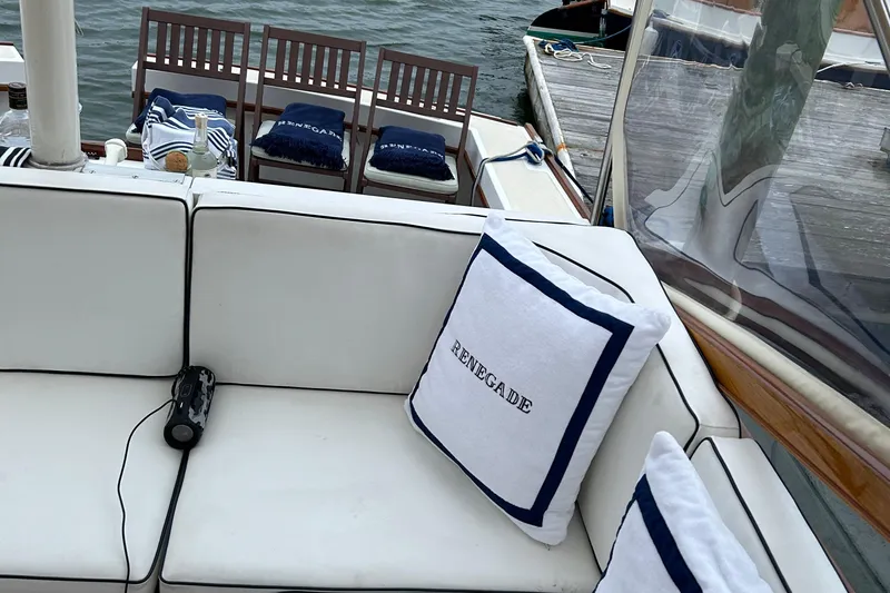 Renegade Yacht Photos Pics Luxurious 1994 Little Harbor Express yacht interior with white seating and nautical decor.