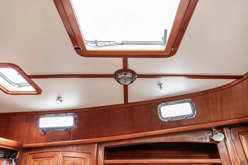 Renegade Yacht Photos Pics Interior view of 1994 Little Harbor Express boat with wooden finish and skylights.
