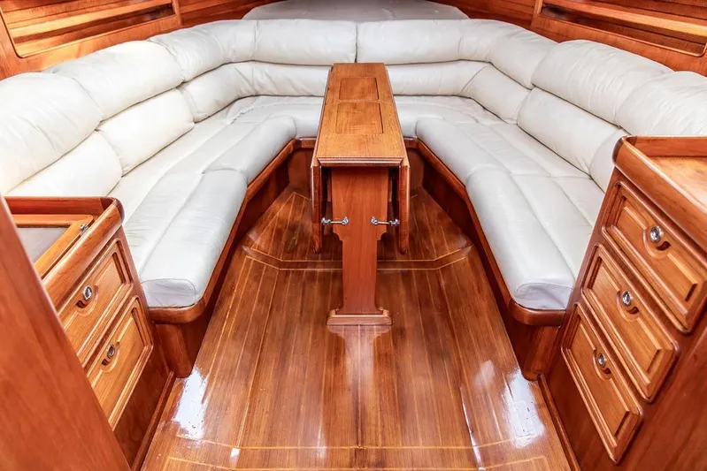 Renegade Yacht Photos Pics Luxurious 1994 Little Harbor Express yacht interior with elegant wood finish and plush seating.