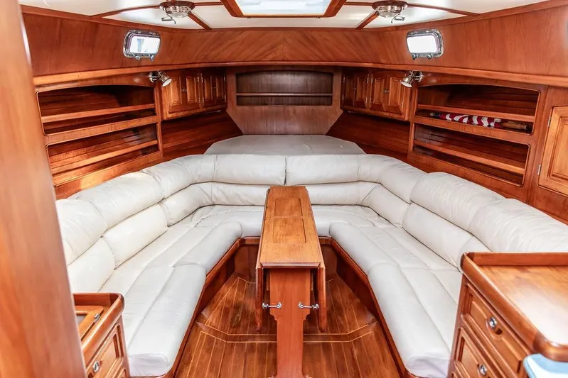 Renegade Yacht Photos Pics Luxurious 1994 Little Harbor Express yacht interior with plush seating and elegant wood finish.