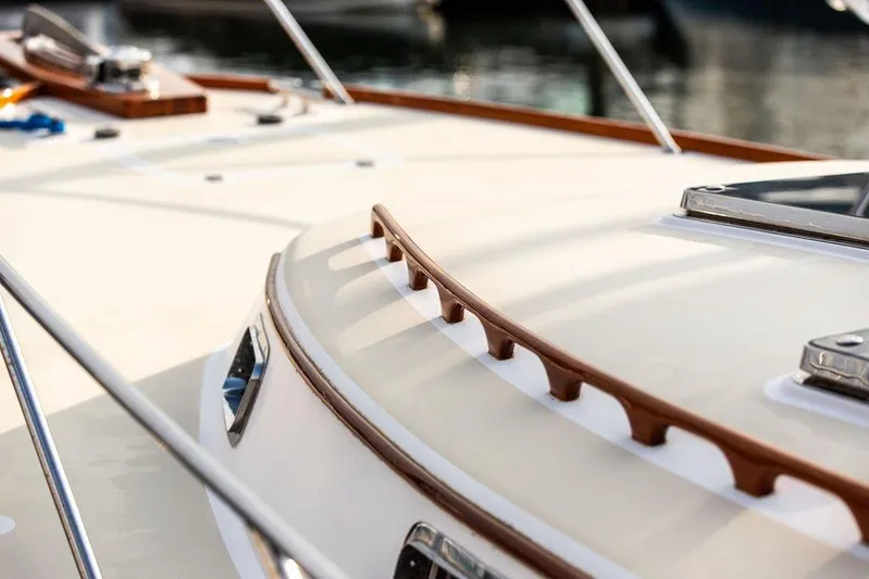 Renegade Yacht Photos Pics 1994 Little Harbor Express boat deck with wooden trim and metal fittings.
