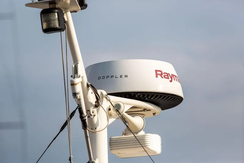 Renegade Yacht Photos Pics Radar equipment on a 1994 Little Harbor Express boat under a clear sky.