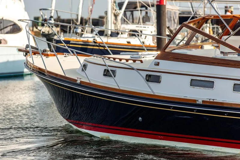 Renegade Yacht Photos Pics 1994 Little Harbor Express yacht docked in marina, showcasing elegant design and craftsmanship.