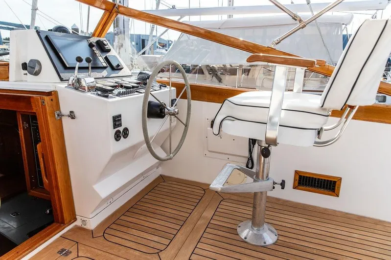 Renegade Yacht Photos Pics 1994 Little Harbor Express boat helm with wooden accents and captain's chair.