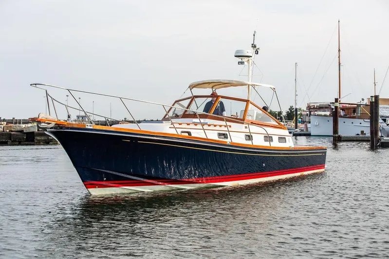 Renegade Yacht Photos Pics 1994 Little Harbor Express yacht in marina, featuring sleek design and classic styling.