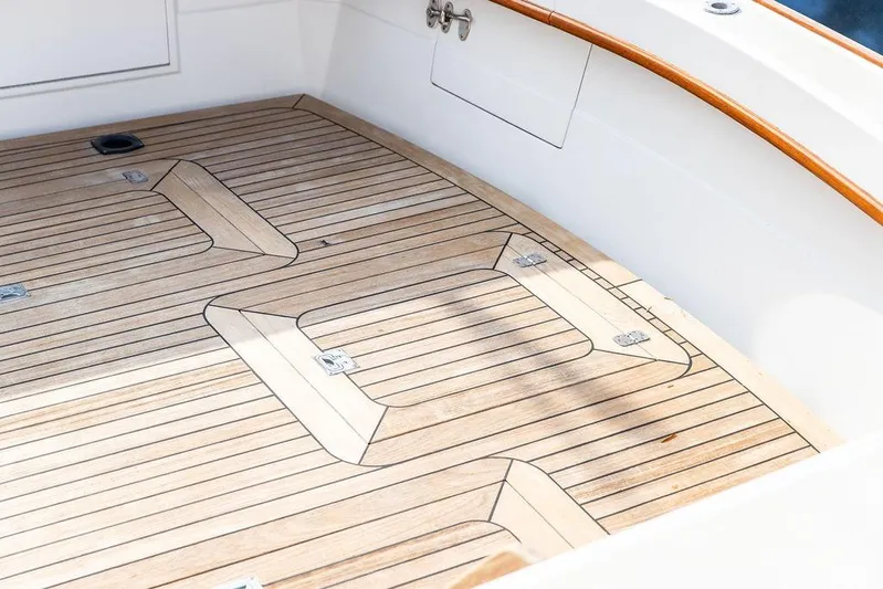 Renegade Yacht Photos Pics Teak deck of 1994 Little Harbor Express boat, showcasing elegant wood finish.