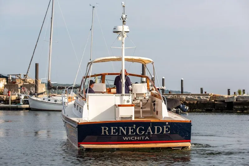 Renegade Yacht Photos Pics 1994 Little Harbor Express boat "Renegade" docked in a marina.