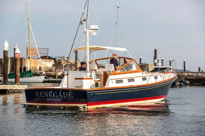 Renegade Yacht Photos Pics 1994 Little Harbor Express boat "Renegade" docked in a marina, Wichita.