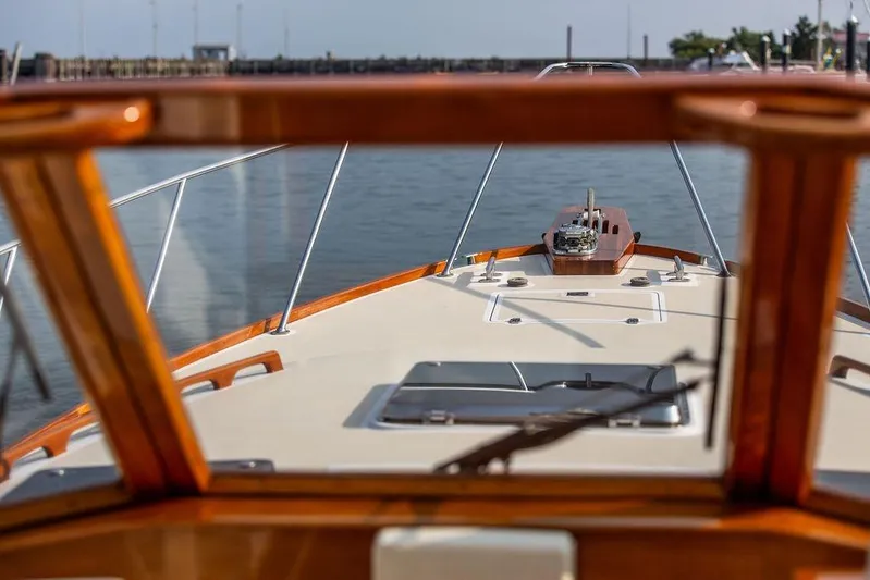 Renegade Yacht Photos Pics 1994 Little Harbor Express boat deck view with wooden trim and calm waters.