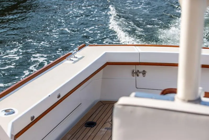 Renegade Yacht Photos Pics 1994 Little Harbor Express boat deck with teak accents on water.