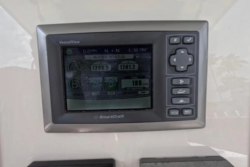 32 Boston Whaler Outrage 2013 Yacht Photos Pics SmartCraft VesselView display on 2013 Boston Whaler 320 Outrage boat dashboard.