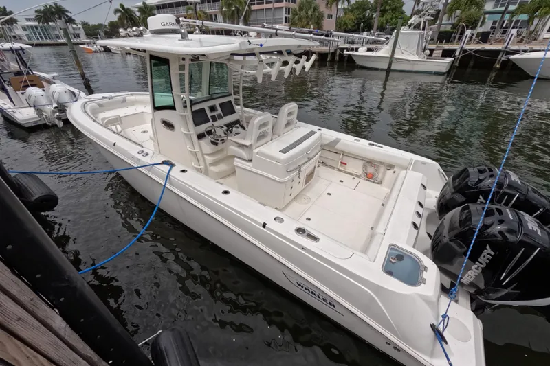 32 Boston Whaler Outrage 2013 Yacht Photos Pics 2013 Boston Whaler 320 Outrage boat docked with dual Mercury engines.
