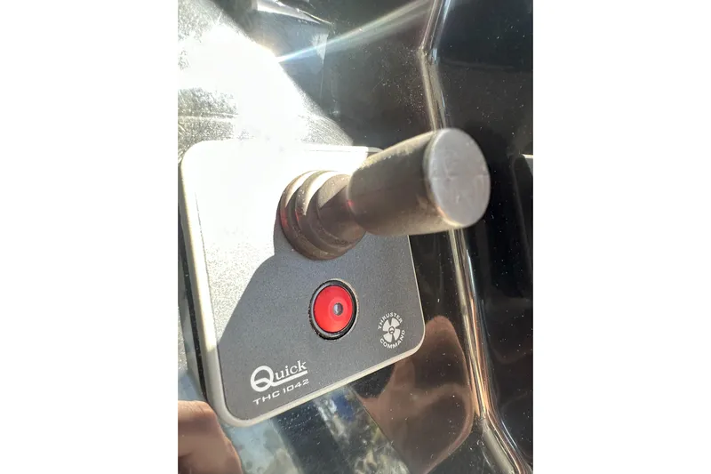 Destination Unknown II Yacht Photos Pics Joystick control panel on a 2021 Jeanneau NC895 boat, featuring Quick THC 1042.