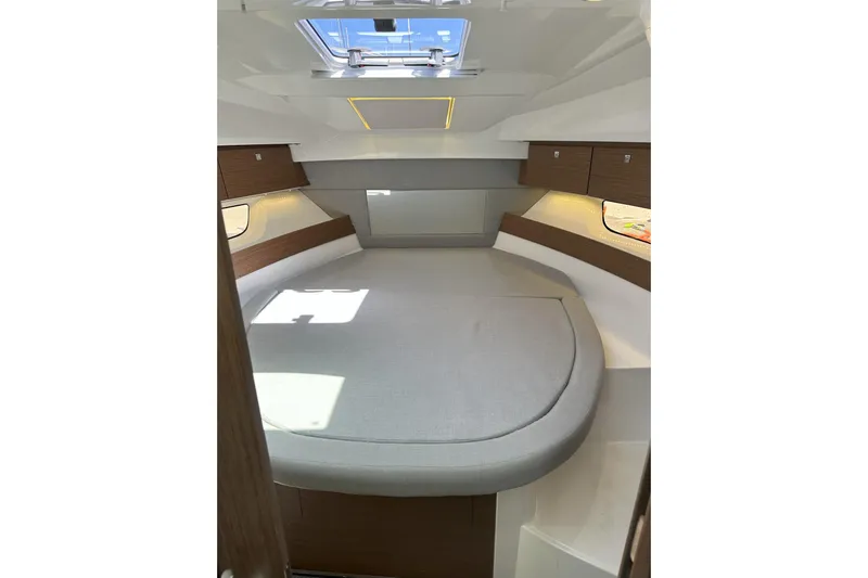 Destination Unknown II Yacht Photos Pics 2021 Jeanneau NC895 cabin interior with skylight and modern design.
