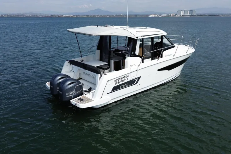 Destination Unknown II Yacht Photos Pics 2021 Jeanneau NC895 boat on water with twin Yamaha engines, Coronado, CA.