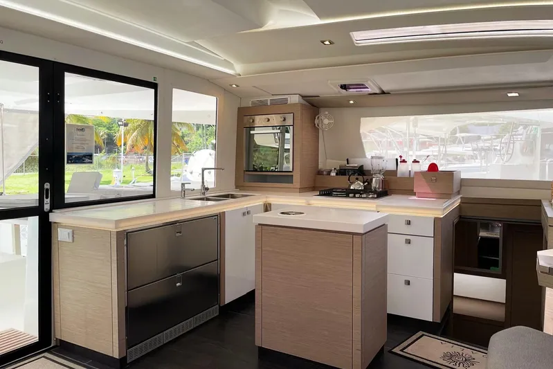 Idalia Yacht Photos Pics Modern kitchen interior of 2020 Fountaine Pajot Saona 47 Maestro catamaran.