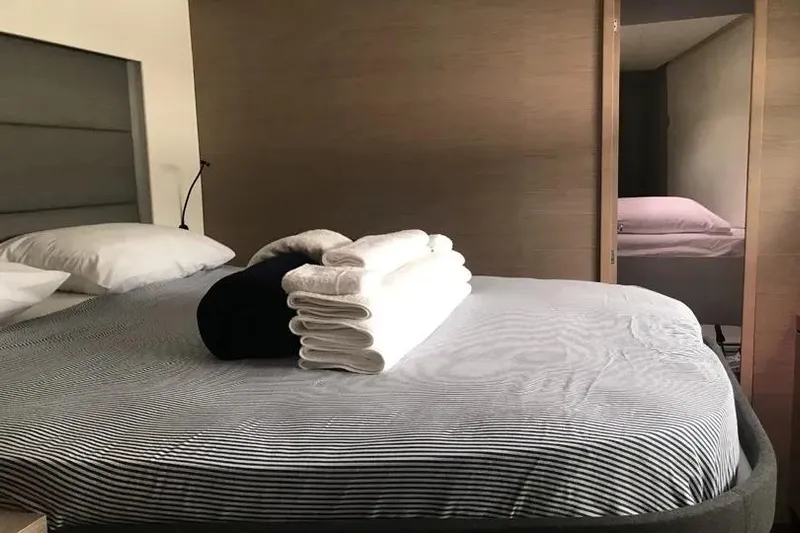 Idalia Yacht Photos Pics Luxurious bedroom in 2020 Fountaine Pajot Saona 47 Maestro yacht with neatly arranged towels.