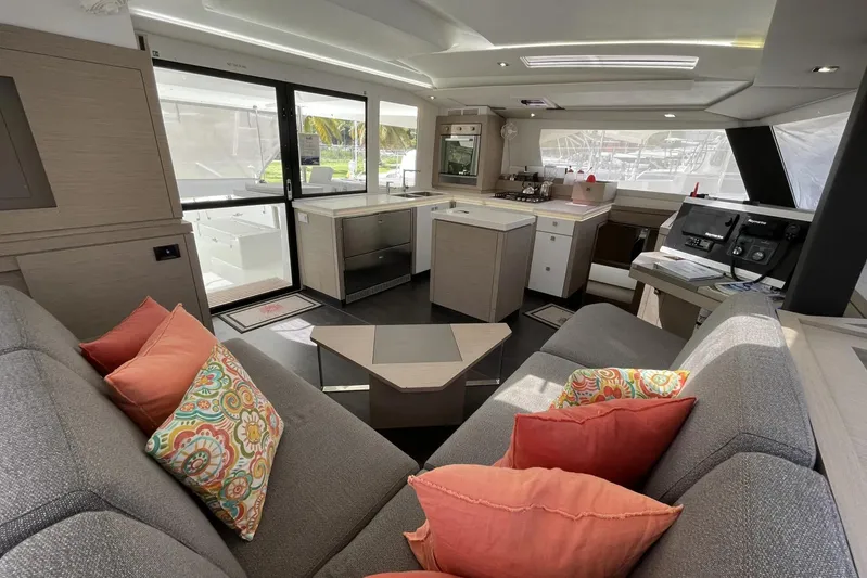 Idalia Yacht Photos Pics Luxurious interior of 2020 Fountaine Pajot Saona 47 Maestro catamaran with modern furnishings.
