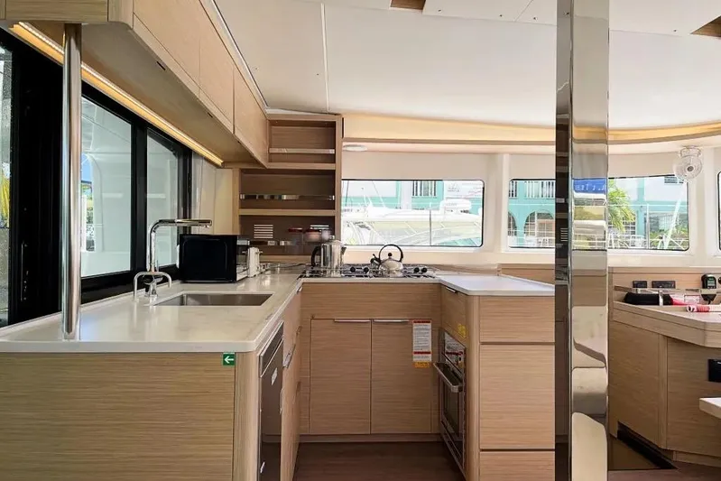 Idalia Yacht Photos Pics Modern kitchen interior of 2020 Fountaine Pajot Saona 47 Maestro catamaran.