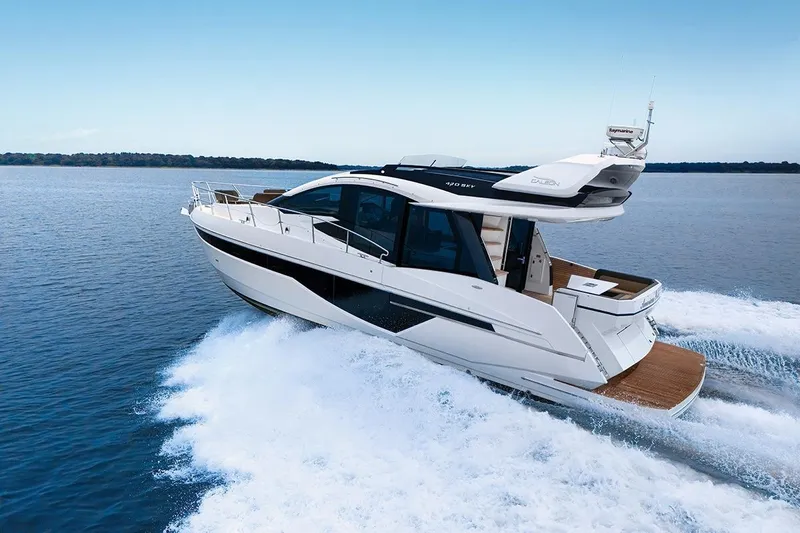 American Pride Yacht Photos Pics 2023 Galeon 470 Sky yacht cruising on open water, showcasing sleek design and luxury features.