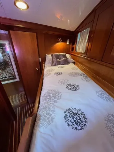 Dame De Coeur Yacht Photos Pics Cozy cabin interior of 1982 Cheoy Lee 66 LRC yacht with elegant bedding.
