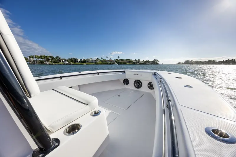  Yacht Photos Pics 2019 SeaHunter 28 Floridian boat on calm water, sunny day, spacious deck.