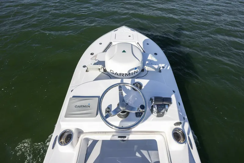  Yacht Photos Pics 2019 SeaHunter 28 Floridian boat with Garmin navigation system on open water.