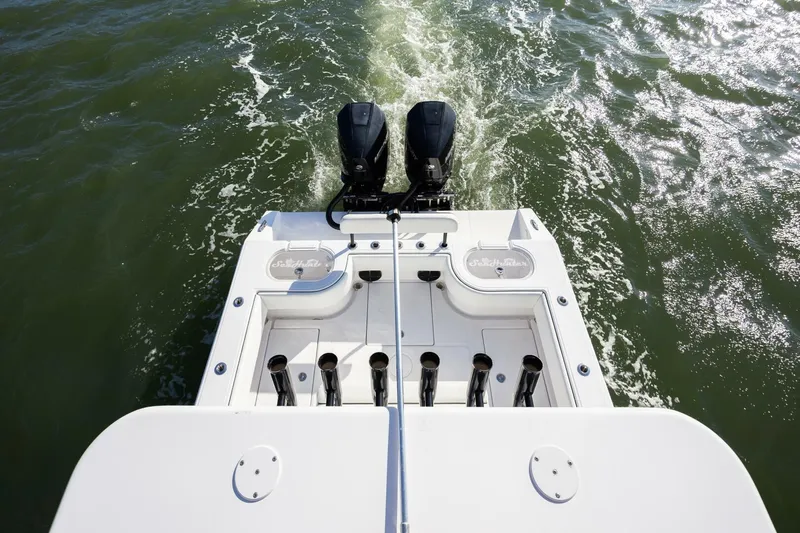  Yacht Photos Pics 2019 SeaHunter 28 Floridian boat with dual engines cruising on water.