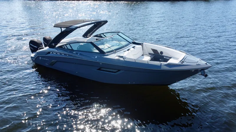 Tgis Yacht Photos Pics 2021 Cruisers Yachts 338 South Beach Edition Bow Rider on shimmering water.