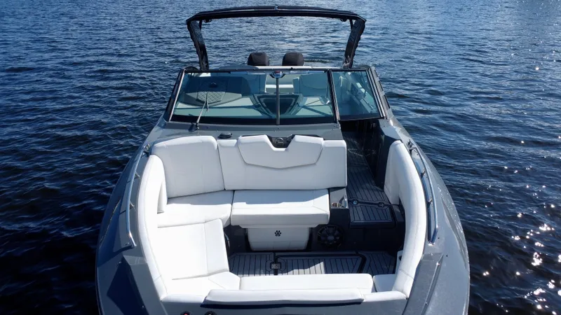 Tgis Yacht Photos Pics 2021 Cruisers Yachts 338 South Beach Edition Bow Rider on water, featuring sleek design.