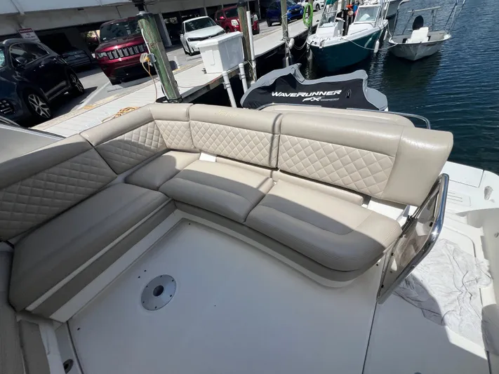  Yacht Photos Pics Luxurious seating on 2013 Sea Ray 410 Sundancer yacht at marina.