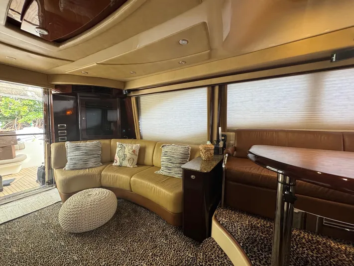 Meccabucks Yacht Photos Pics Luxurious interior of a 2007 Sea Ray 52 Sedan Bridge yacht with plush seating.