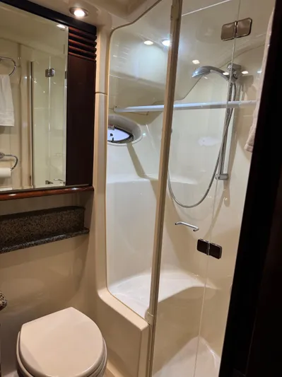 Meccabucks Yacht Photos Pics Luxurious bathroom in 2007 Sea Ray 52 Sedan Bridge yacht with shower and toilet.