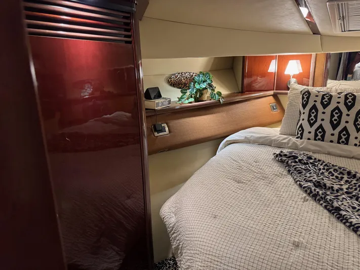 Meccabucks Yacht Photos Pics Luxurious cabin interior of a 2007 Sea Ray 52 Sedan Bridge yacht with elegant bedding.