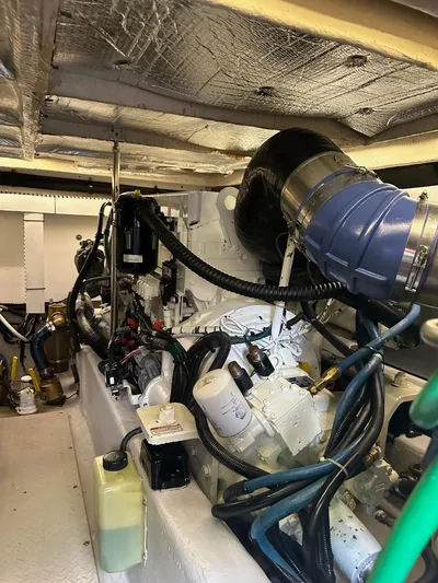 Meccabucks Yacht Photos Pics Engine room of 2007 Sea Ray 52 Sedan Bridge with visible components and wiring.